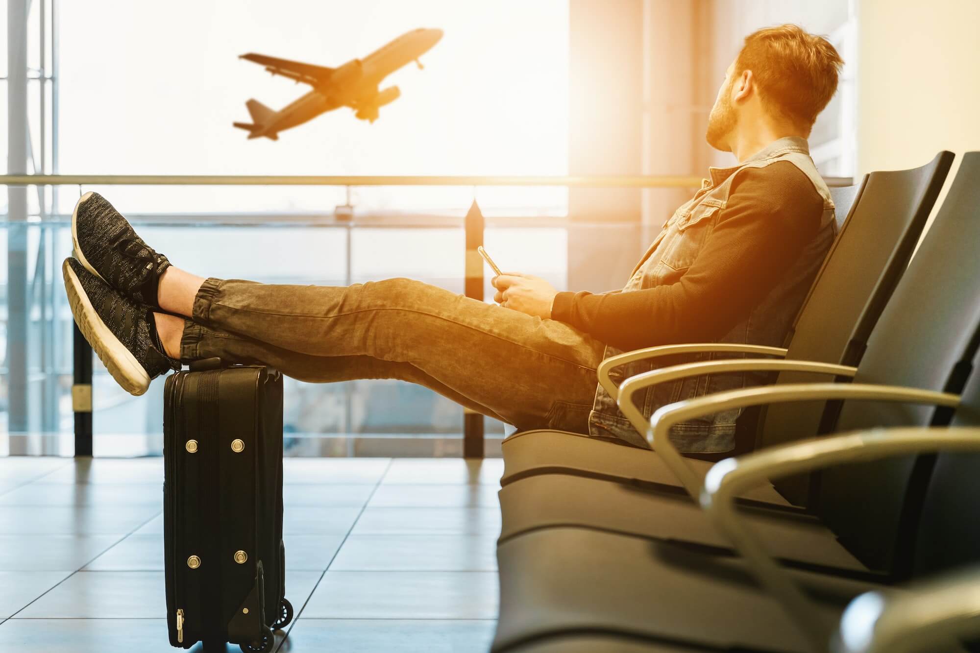 Man waiting in airport for flight