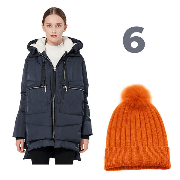 Blue Puffer coat and an orange cashmere beanie with rabbit fur pom pom