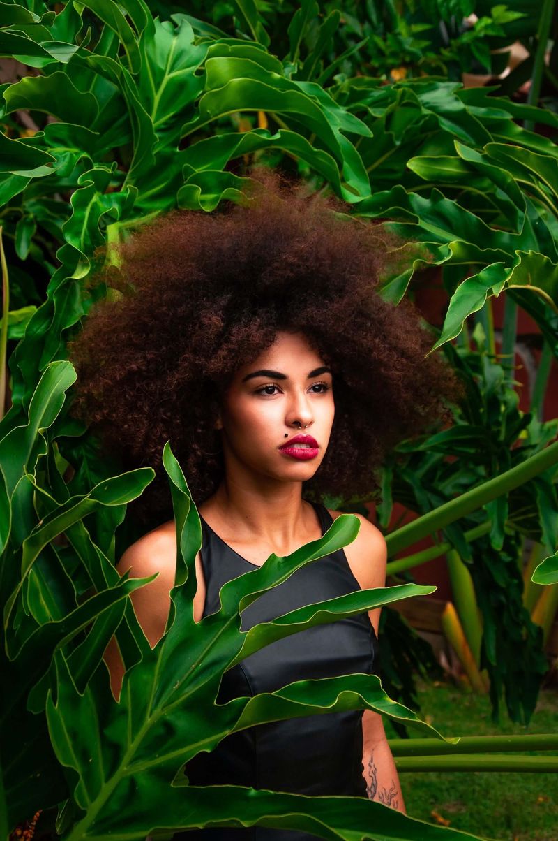 Women in Satin Shirt in Leaves